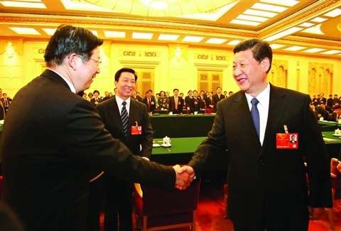 习近平:网民检验水质标准是市长敢不敢下湖游泳